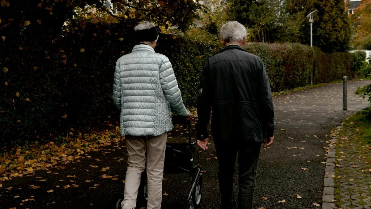 Older adult walking with mobility support for fall prevention after stroke